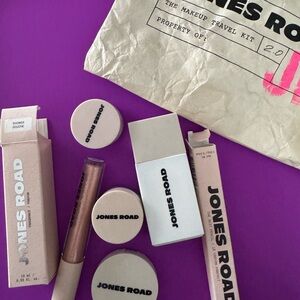 Jones Road makeup, fragrance, and makeup bag